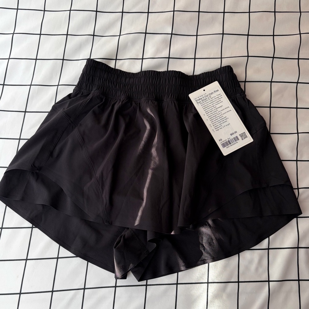 Woman’s Black Lululemon Shake It Out High-rise Shorts, Length 2.5”, Size XS NWT.